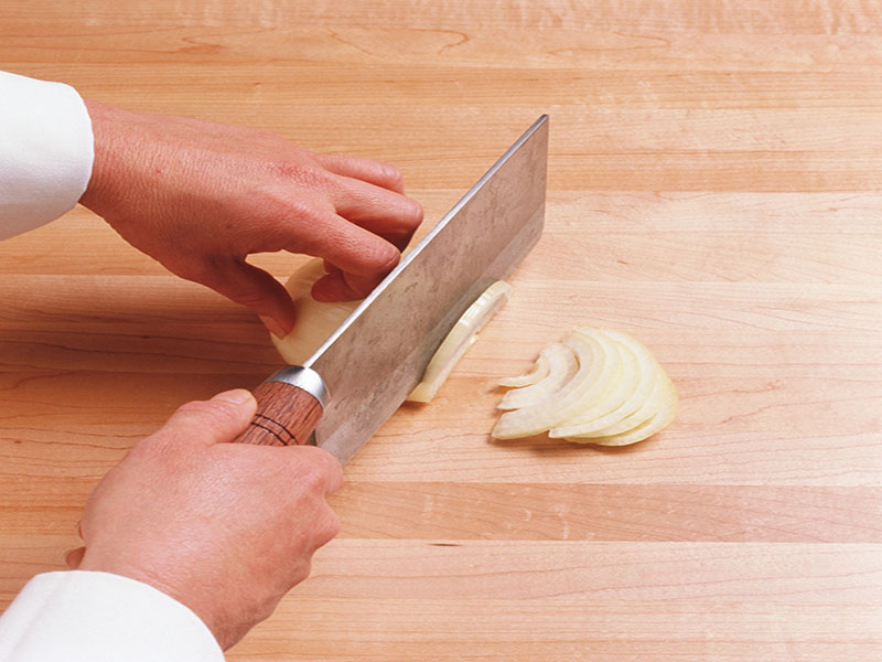 News Picture: Why Chopping Onions Makes You Cry