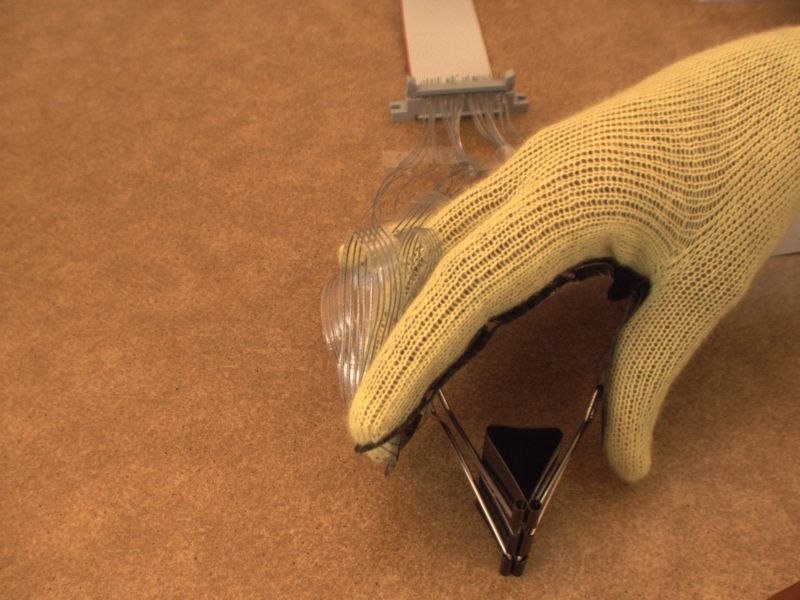 Sensor-Laden Glove Helps Robotic Hands 'Feel' Objects